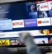 BERLIN, GERMANY - FEBRUARY 21: Symbol photo: The logos of the streaming services Amazon Prime Video, Netflix, amazon music and youtube can be seen on a television on February 21, 2020 in Berlin, Germany. (Photo by Thomas Trutschel/Photothek via Getty Images)