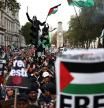 People take part in a 'March For Palestine', in London on October 21, 2023, to 
