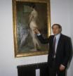 Milan, Italy, 1985, Silvio Berlusconi joking with a nude female painting (Photo Archivio Cicconi/Getty Images)