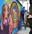 Perros, flores y almas: murales de colores para dar vida al cementerio