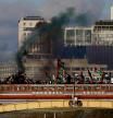 Protesters walk across Vauxhall Bridge during a pro-Palestinian protest in London, Saturday, Nov. 11, 2023. London police have stepped up efforts to ensure a pro-Palestinian march on Saturday remains peaceful following a week of political sparring over whether the demonstration should go ahead on the weekend Britain honors its war dead.(AP Photo/Alberto Pezzali)