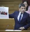 El presidente de la Generalitat Valenciana, Carlos Mazón, durante su intervención en Les Corts.