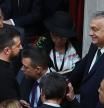 Ukraine's President Volodymyr Zelensky (L) chats with Hungary's Prime Minister Viktor Orban (R) during the inauguration of Argentina's new president Javier Milei at the Congress in Buenos Aires on December 10, 2023. Libertarian economist Javier Milei was sworn in Sunday as Argentina's president, after a resounding election victory fuelled by fury over the country's economic crisis. (Photo by ALEJANDRO PAGNI / AFP)