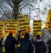 LONDON, ENGLAND - DECEMBER 6: Anti-vaccine protesters hold placards as they demonstrate outside the Covid Inquiry on the day that Boris Johnson, Britain's former Prime Minister, is due to testify, on December 6, 2023 in London, England. Britain's former Prime Minister will be questioned during phase 2 of the Covid-19 Inquiry over government decision-making during the pandemic. (Photo by Carl Court/Getty Images)