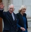 LONDON, ENGLAND - JANUARY 29: King Charles III waves as he departs with Queen Camilla after receiving treatment for an enlarged prostate at The London Clinic on January 29, 2024 in London, England. The King has been receiving treatment for an enlarged prostate, spending three nights at the London Clinic and visited daily by his wife Queen Camilla. (Photo by Carl Court/Getty Images)