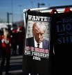 Merchandise with the mugshot of former US President and 2024 presidential hopeful Donald Trump is displayed outside a Commit to Caucus Rally in Las Vegas, Nevada, on January 27, 2024. (Photo by Patrick T. Fallon / AFP)