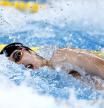 Swimming - World Aquatics Championships - Aspire Dome, Doha, Qatar - February 11, 2024 China's Pan Zhanle in action during the men's 4x100m freestyle relay heats REUTERS/Clodagh Kilcoyne