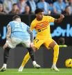 VIGO, SPAIN - FEBRUARY 17: Lamine Yamal of FC Barcelona is challenged by Mihailo Ristic of Celta Vigo during the LaLiga EA Sports match between Celta Vigo and FC Barcelona at Estadio Balaidos on February 17, 2024 in Vigo, Spain. (Photo by Juan Manuel Serrano Arce/Getty Images)