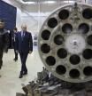 Russian President Vladimir Putin, center, and Alexander Karamyshev, Hero of Russia, and the head of aerial weapons training and tactical training center visit the 344th State Centre for Deployment and Retraining of Flight Personnel of the Russian Defense Ministry in Torzhok, Tver region, 217 km (136 miles) north-west of Moscow, Russia, Wednesday, March 27, 2024. (Mikhail Metzel, Sputnik, Kremlin Pool Photo via AP)