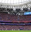 A screen displaying the attendance number of spectators during the women's Champions League final soccer match between FC Barcelona and Olympique Lyonnais at the San Mames stadium in Bilbao, Spain, Saturday, May 25, 2024. (AP Photo/Jose Breton)