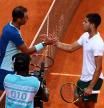 MADRID, SPAIN - MAY 06: Carlos Alcaraz of Spain shakes hands at the net after his three set victory in his quarterfinal match against Rafael Nadal of Spain during day nine of the Mutua Madrid Open at La Caja Magica on May 06, 2022 in Madrid, Spain. (Photo by Clive Brunskill/Getty Images)