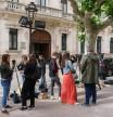 Journalists wait in front of the Archbishopric of Burgos, where the Poor Clare Sisters of Belorado were expected to be heard, in Burgos in northern Spain, on June 21, 2024. A community of nuns in a 15th century convent in northern Spain has split with the Roman Catholic Church because of a property dispute and doctrinal wrangling that has seen them join up with a renegade priest. (Photo by CESAR MANSO / AFP)