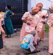 A group of women prepare for the annual Ojude Oba festival in Ijebu Ode on June 18, 2024. Ojude Oba festival is an ancient festival celebrated by the Yoruba people of Ijebu Ode, a town in Ogun State Nigeria. This annual festival usually takes place the third day after Eid El Kabir to pay homage and show respect to the King the Awujale of Ijebuland. (Photo by TOYIN ADEDOKUN / AFP)