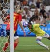Brazil's forward #09 Adriana scores her team's third goal in spite of Spain's goalkeeper #13 Cata Coll in the women's semi-final football match between Brazil and Spain during the Paris 2024 Olympic Games at the Marseille Stadium in Marseille on August 6, 2024. (Photo by Sylvain THOMAS / AFP)