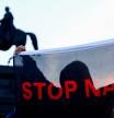 Dresden (Germany), 29/08/2024.- A protester agaisnt far-right Alternative for Germany (AfD) raises a 'Stop Nazi' banner, during a final election campaign rally of AfD party, in Dresden, Germany, 29 August 2024. Saxony state election, voting for the regional parliament 'Landtag', will be held on 01 September 2024. (Protestas, Alemania, Dresde) EFE/EPA/FILIP SINGER