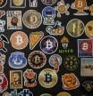 Stickers showing Bitcoin logo cryptocurrency at a cryptocurrency exchange in Barcelona, Spain, on Monday, Nov. 11, 2024. Bitcoin's value surged past $82,000 due to President-elect Donald Trump's support for digital assets and the prospect of a Congress with pro-crypto lawmakers. Photographer: Angel Garcia/Bloomberg
