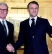 Keir Starmer, UK prime minister, left, and Emmanuel Macron, France's president, arrive for a bilateral meeting, at Chequers near Aylesbury, UK, on Thursday, Jan. 9, 2025. Starmer and Macron will discuss issues including Ukraine. Photographer: Neil Hall/EPA/Bloomberg