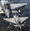 FILE - Italian Air Force Eurofighter Typhoon military fighter jets participate in NATO's Baltic Air Policing Mission operate in Lithuanian airspace, on Sept.12, 2023. (AP Photo/Mindaugas Kulbis, File)