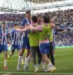 CORNELLÁ DE LLOBREGAT (BARCELONA), 29/03/2025.-Los jugadores del RCD Espanyol celebran el gol de Javier Puado contra el Atlético de Madrid, durante el partido de la jornada 29 de LaLiga entre el RCD Espanyol y el Atlético de Madrid, este sábado en el RCDE Stadium en Cornellá de Llobregat (Barcelona).- EFE/ Alejandro Garcia