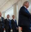 (L/R) Italian Prime Minister Giorgia Meloni, French President Emmanuel Macron, Finnish President Alexander Stubb and US President Donald Trump walk through the Cross Hall to the East Room on their way to meet with Ukrainian President Volodymyr Zelensky and European leaders at the White House in Washington, DC, on August 18, 2025. European leaders join Ukrainian President Volodymyr Zelensky in talks with US President Donald Trump on August 18, as they try to find a way to end Russia's offensive. The leaders heading to Washington on Monday to appear alongside Zelensky call themselves the