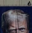 A large banner featuring U.S. President Donald Trump hangs on the Department of Labor building in Washington, D.C., U.S., in Washington, D.C., U.S., August 26, 2025. REUTERS/Brian Snyder TPX IMAGES OF THE DAY