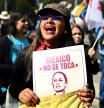 A demonstrator shouts slogans during a march in Mexico City on January 10, 2026, in support of deposed Venezuelan president Nicolas Maduro and his wife Cilia Flores and against a possible US intervention in Mexico. Mexican President Claudia Sheinbaum said her government wanted closer security coordination with the US and repeatedly opposed any foreign military intervention after Donald Trump threatened to launch ground attacks against drug cartels. (Photo by Alfredo ESTRELLA / AFP)
