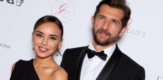 Singer Chenoa and Miguel Sanchez Encinas at the photocall during the Global Gift Gala 2021 on October 30, 2021 in Paris, France.