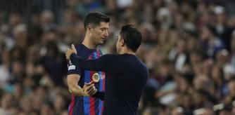 Lewandowski y Xavi, en un partido del Barça