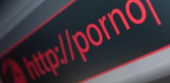 Close Up of Web Browser - Red Porno Sign in Address Bar - Shallow Depth of Field