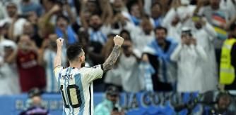 Argentina's Lionel Messi celebrates after scores during the penalty shootout in the World Cup quarterfinal soccer match between the Netherlands and Argentina, at the Lusail Stadium in Lusail, Qatar, Saturday, Dec. 10, 2022. (AP Photo/Ebrahim Noroozi)