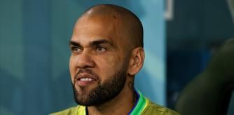 AL RAYYAN, QATAR - DECEMBER 09: Dani Alves #13 of Brazil looks on during the FIFA World Cup Qatar 2022 quarter final match between Croatia and Brazil at Education City Stadium on December 09, 2022 in Al Rayyan, Qatar. (Photo by Zhizhao Wu/Getty Images)