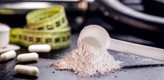 Sports supplement, creatine, hmb, bcaa, amino acid or powdered vitamin. Sports nutrition concept. bcaa, l-carnitine, creatine