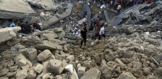 Palestinians inspect the site where there was a Greek Orthodox church, destroyed following Israeli airstrikes on Gaza City, Friday, Oct. 20, 2023. (AP Photo/Abed Khaled)