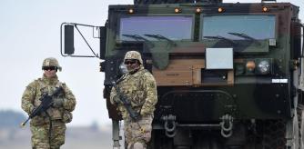 (FILES) US soldiers patrol prior to an artillery live fire event by the US Army Europe's 41st Field Artillery Brigade at the military training area in Grafenwoehr, southern Germany, on March 4, 2020. Two German-Russian nationals have been arrested in Bavaria on suspicion of spying for Russia and planning acts of sabotage to undermine military support for Ukraine, German federal prosecutors said on April 18, 2024. The two men, identified only as Dieter S. and Alexander J., were arrested in the city of Bayreuth prosecutors said. They are accused of scouting potential targets for attacks, 