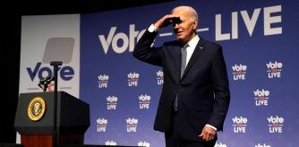 (FILES) US President Joe Biden gestures near the podium during the Vote To Live Properity Summit at the College of Southern Nevada in Las Vegas, Nevada, on July 16, 2024. US President Joe Biden doubled down on his insistence that he will stay in the White House race, despite a growing Democrat revolt that raised speculation he could bow out as soon as this weekend. #{emoji}147;The stakes are high, and the choice is clear. Together, we will win,