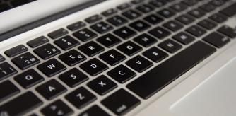 laptop's keyboard view from the left oblique front side · left center part of the focused keyboard