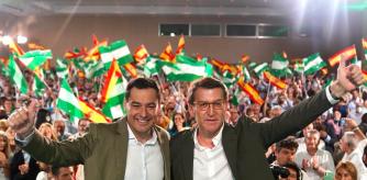 El presidente del PP, Alberto Núñez Feijóo, junto al presidente andaluz, Juanma Moreno, en el primer mitin de precampaña, en Sevilla