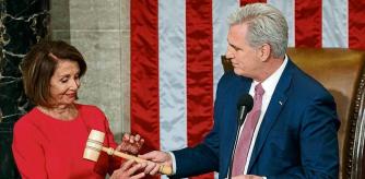 FILE - Nancy Pelosi of California takes the gavel from House Minority Leader Kevin McCarthy, R-Calif., after being elected House Speaker at the Capitol in Washington, Jan. 3, 2019. (AP Photo/Carolyn Kaster, File)
