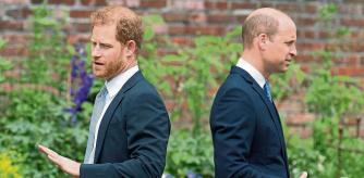 FILE - Prince Harry, left, and Prince William stand together during the unveiling of a statue they commissioned of their mother Princess Diana, on what would have been her 60th birthday, in the Sunken Garden at Kensington Palace, London, Thursday July 1, 2021. Prince Harry has said he wants to have his father and brother back and that he wants “a family, not an institution,” during a TV interview ahead of the publication of his memoir. The interview with Britain’s ITV channel is due to be released this Sunday. (Dominic Lipinski /Pool Photo via AP, File)