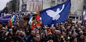 BERLIN, GERMANY - APRIL 08: People gather for the annual Easter peace march on April 8, 2023 in Berlin, Germany. Traditional Easter peace marches are taking place across Germany today with participants calling for an end to the war in Ukraine. Critics charge it is too early for negotiations and that Ukraine must be enabled to liberate its territories occupied by Russia first. (Photo by Carsten Koall/Getty Images)