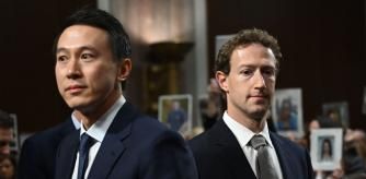 TOPSHOT - (L-R) Shou Zi Chew, CEO of TikTok and Mark Zuckerberg, CEO of Meta, arrive to testify before the US Senate Judiciary Committee hearing, 