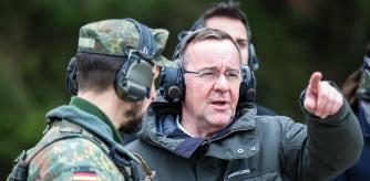 OBERVIECHTACH, GERMANY - FEBRUARY 28: German Defence Minister Boris Pistorius speaks with soldiers of the Bundeswehr Panzergrenadierbataillon 122 armoured infantry battalion during a live-fire exercise prior to the unit's deployment to Poland and then Lithuania on February 28, 2024 in Weiden, Germany. A total of three battalions are preparing today to ship east to take part in the ongoing NATO Steadfast Defender military exercises. Afterwards they will continue to Lithuania, where Germany is expanding its presence in leading a NATO multinational contingent. (Photo by Leonhard Simon/Getty Images)