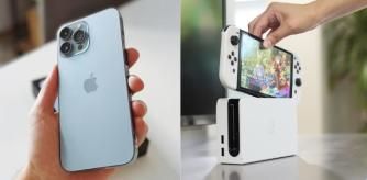 Un iPhone 15 y una Nintendo Swith blanca.