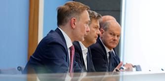 German Chancellor Olaf Scholz of the Social Democratic Party SPD, his coalition partners Finance Minister Christian Lindner of the Liberal Party FDP, and Economy Minister Robert Habeck of the Greens arrive for a joint news conference after agreeing on the 2025 budget in Berlin, Germany, July 5, 2024.    REUTERS/Axel Schmidt