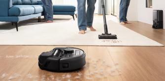 Un robot aspirador que integra un aspiradora de mano