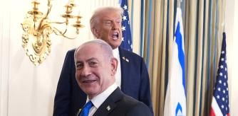 President Donald Trump speaks upon departing a news conference with Israeli Prime Minister Benjamin Netanyahu, in foreground, in the State Dining Room of the White House, Monday, Sept. 29, 2025, in Washington. (AP Photo/Evan Vucci)