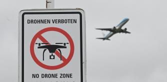 A sign with a drone ban is displayed outside the airport in Munich, Germany October 6, 2025.