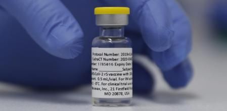 A vial of the Phase 3 Novavax coronavirus vaccine is seen ready for use in the trial at St. George's University hospital in London Wednesday, Oct. 7, 2020. Novavax Inc. said Thursday Jan. 28, 2021 that its COVID-19 vaccine appears 89% effective based on early findings from a British study and that it also seems to work — though not as well — against new mutated strains of the virus circulating in that country and South Africa. (AP Photo/Alastair Grant)