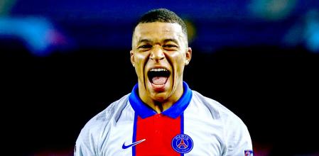 PSG's Kylian Mbappe celebrates after scoring his side's second goal during the Champions League round of 16, first leg soccer match between FC Barcelona and Paris Saint-Germain at the Camp Nou stadium in Barcelona, Spain, Tuesday, Feb. 16, 2021. (AP Photo/Joan Monfort)