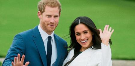(FILES) In this file photo taken on November 27, 2017 Britain's Prince Harry and his fiancée US actress Meghan Markle pose for a photograph in the Sunken Garden at Kensington Palace in west London on November 27, 2017, following the announcement of their engagement. - Meghan Markle has experienced remarkable highs and lows during a tumultuous period in which she married into royalty and became a mother before souring on life in Britain and returning to the United States. The 39-year-old American former television actress shot to global stardom with her engagement to Prince Harry in 2017 and their fairytale wedding six months later. (Photo by Daniel LEAL-OLIVAS / AFP)
